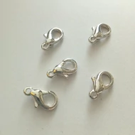 Delfin kapocs 10mm (nikkel mentes) ezüst színű 5db/cs.