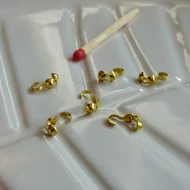 Csomórejtő (csomóbújtató) 4mm gömb arany színű 6db/cs.