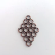 Kiegészítő vörösréz színű  lyukacsos rombusz 30*20mm