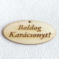 Fa tábla feliratos ovál 40*80mm egy lyukkal: "Boldog Karácsonyt!"