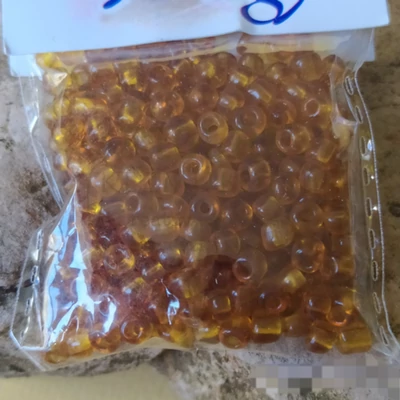 Üveggyöngy maggyöngy 20g átlátszó borostyánsárga